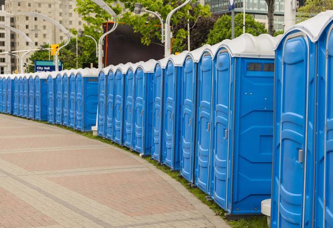 portable restrooms lined up at a marathon, ensuring runners can take a much-needed bathroom break in Aurora